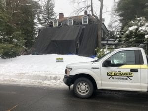 Asphalt Shingle Roof Replacement during winter roof work.